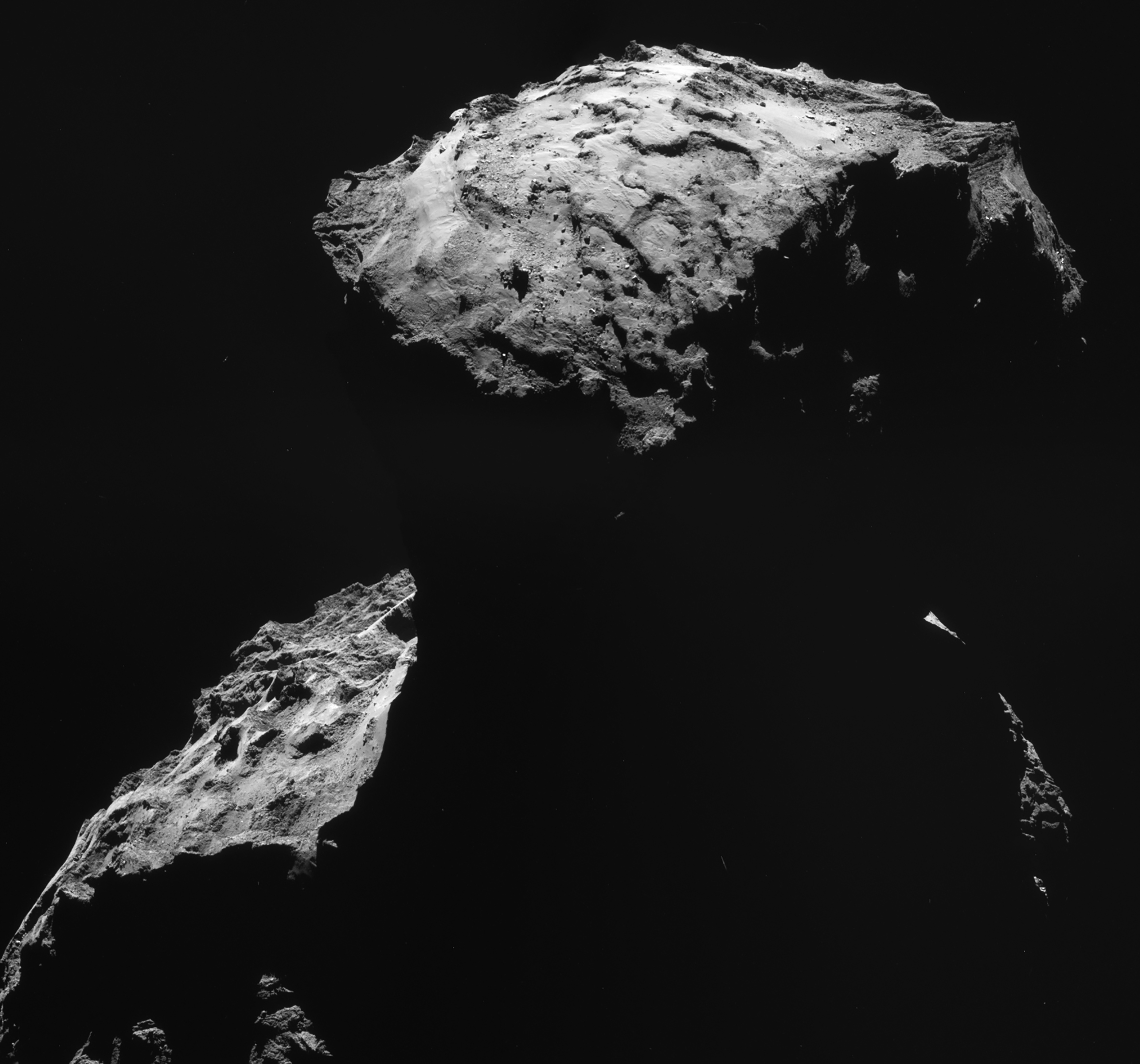 Mosaic of four images taken by the spacecraft Rosetta's navigation camera (NAVCAM) on 19 September 2014 at 28.6 km (17.8 mi) from the centre of comet 67P/Churymov-Gerasimenko. Copyright: European Space Agency